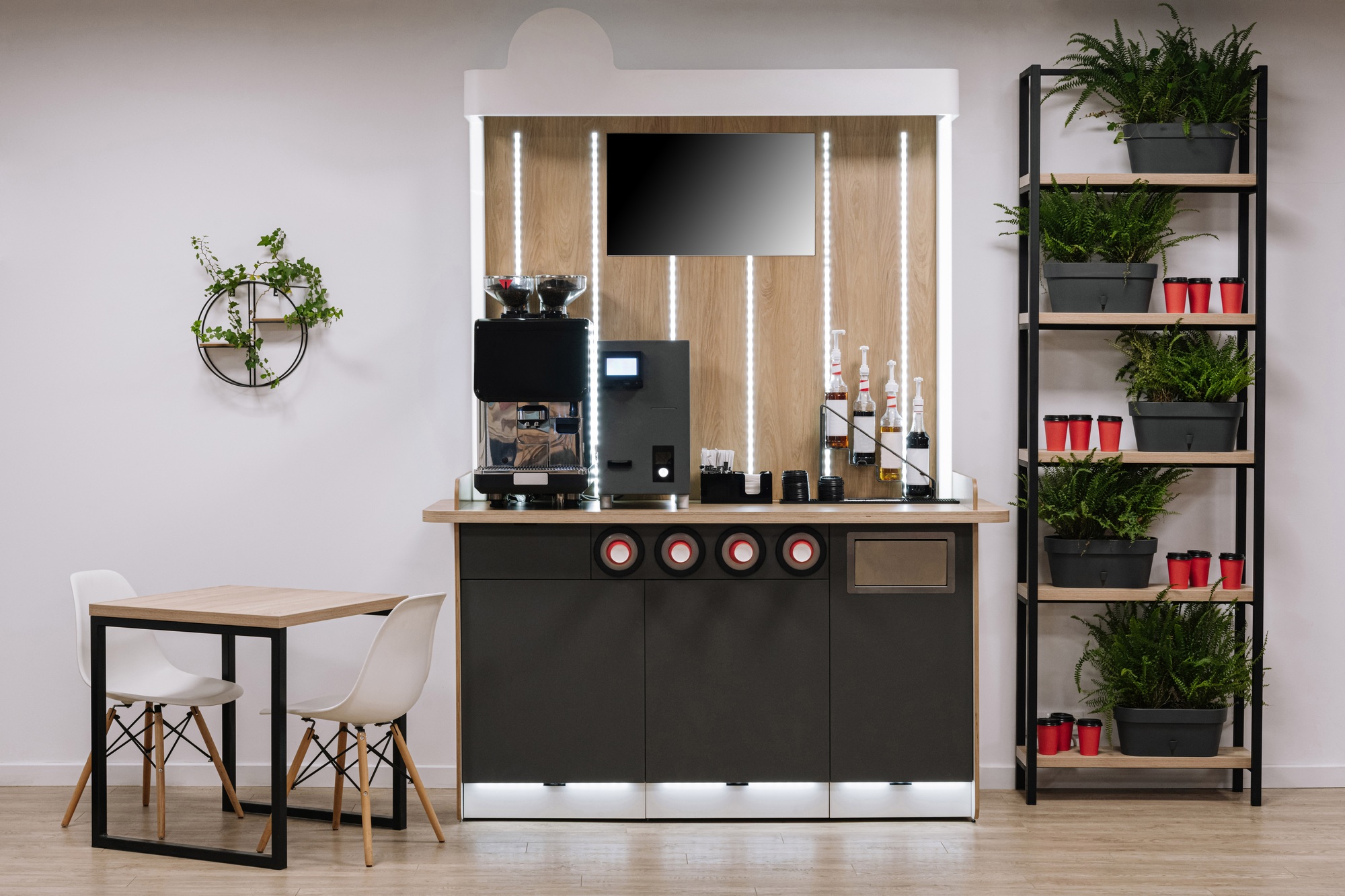 Modern office coffee station with plants